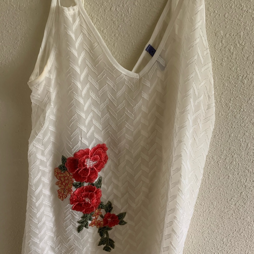 white embroidered detailed top